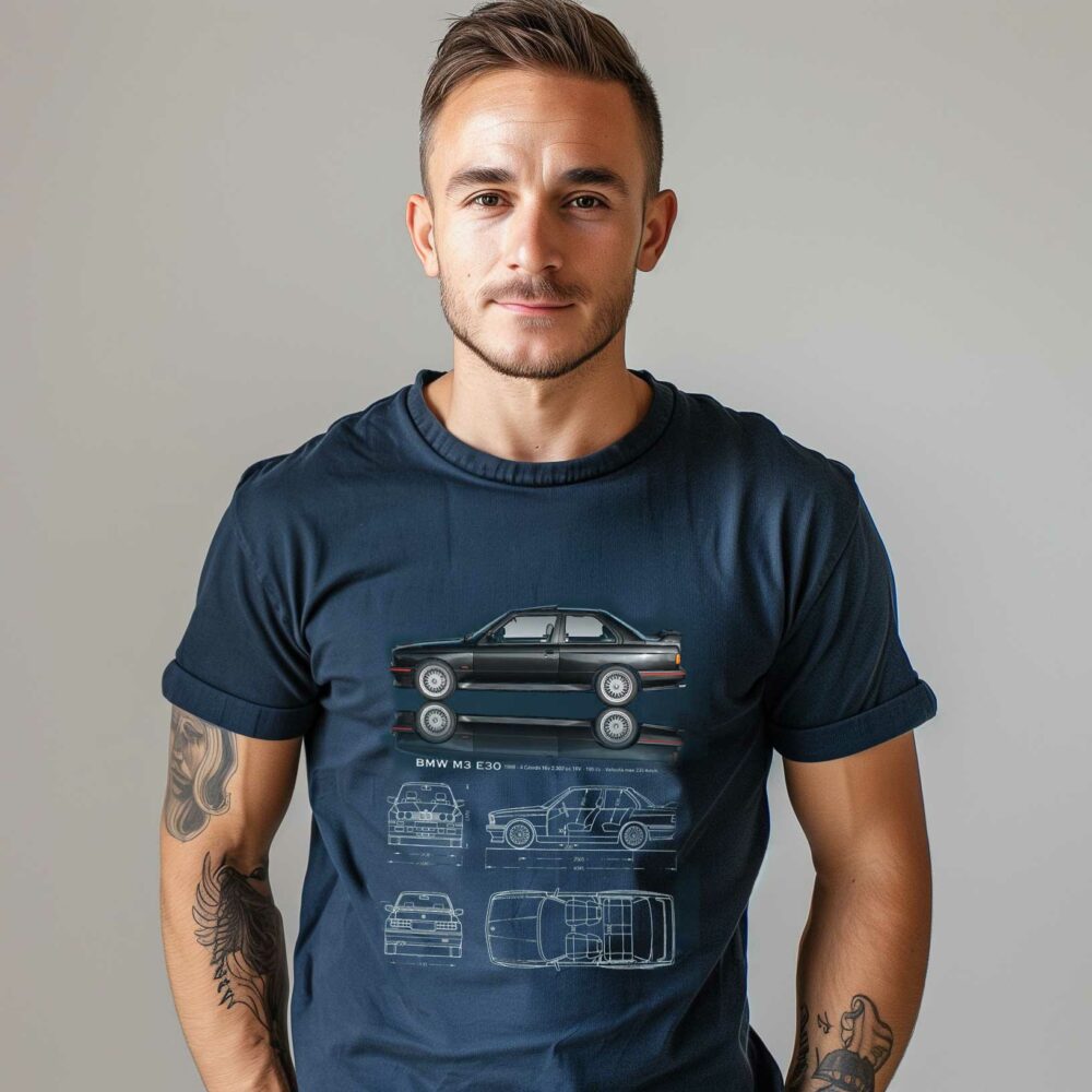 Man in car blueprint t-shirt with tattoos.